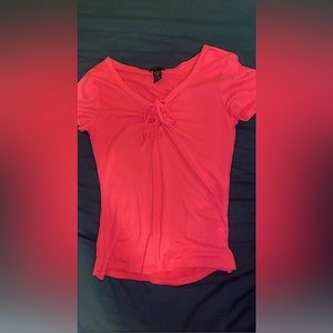 Cute neon pink top, worn twice. Can dress up or down.